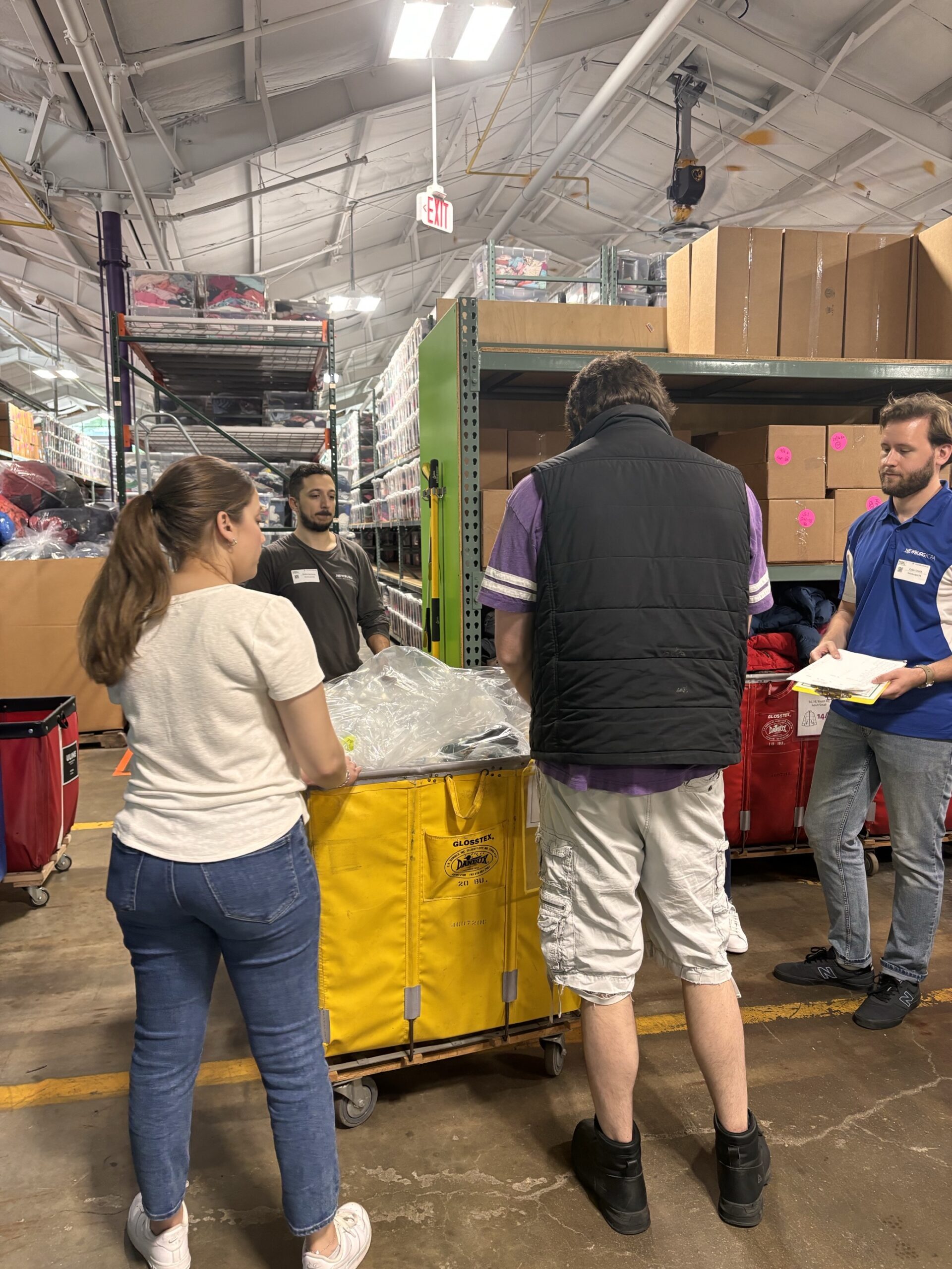 ALC & PB Newburg | CPA - Images of our team volunteering at Cradles to Crayons