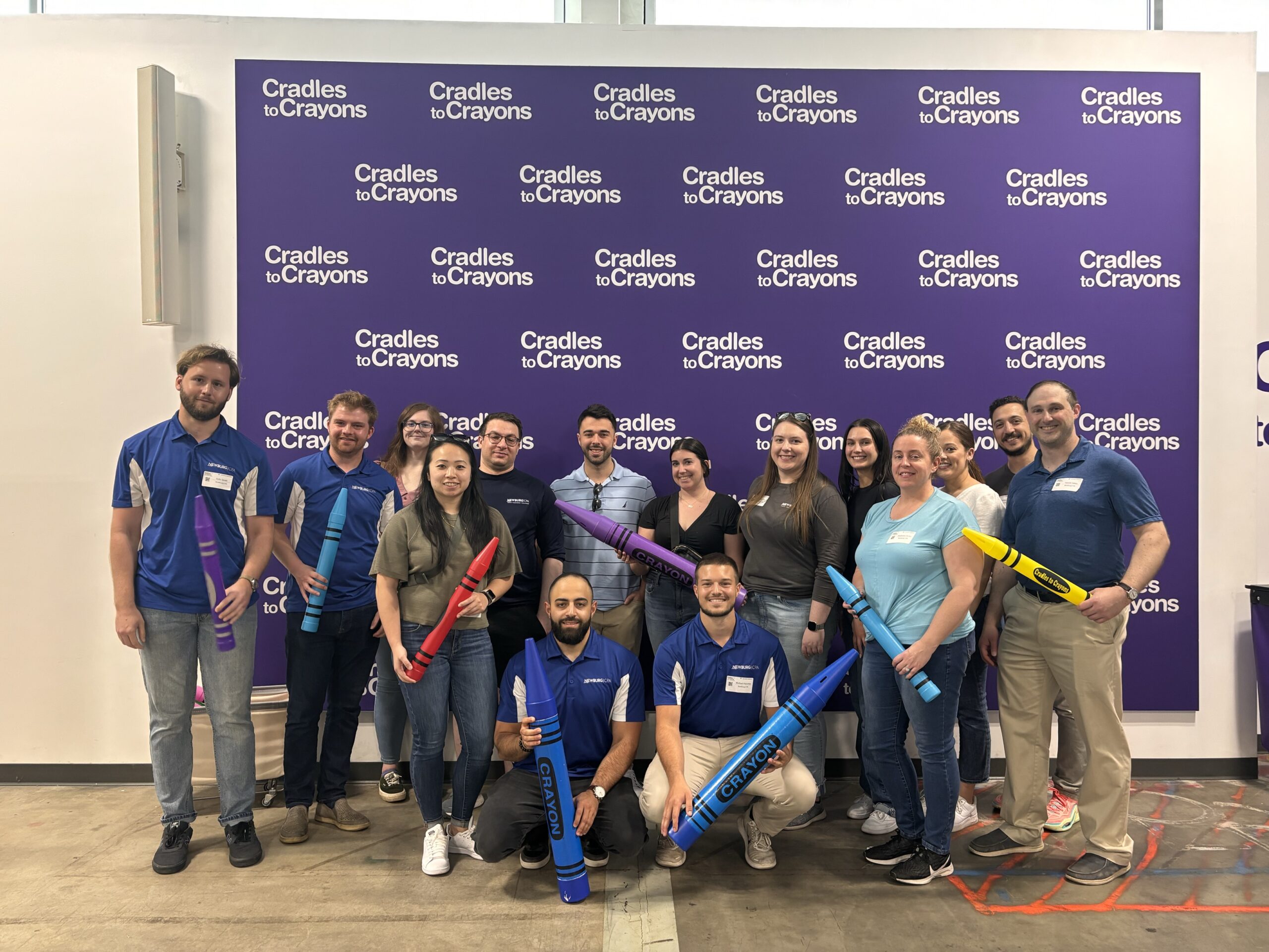 Newburg CPA - Images of our team volunteering at Cradles to Crayons