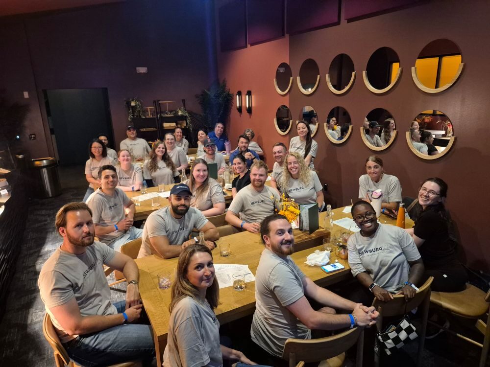Group posing for a photo in a restaurant Group posing for a photo in a restaurant