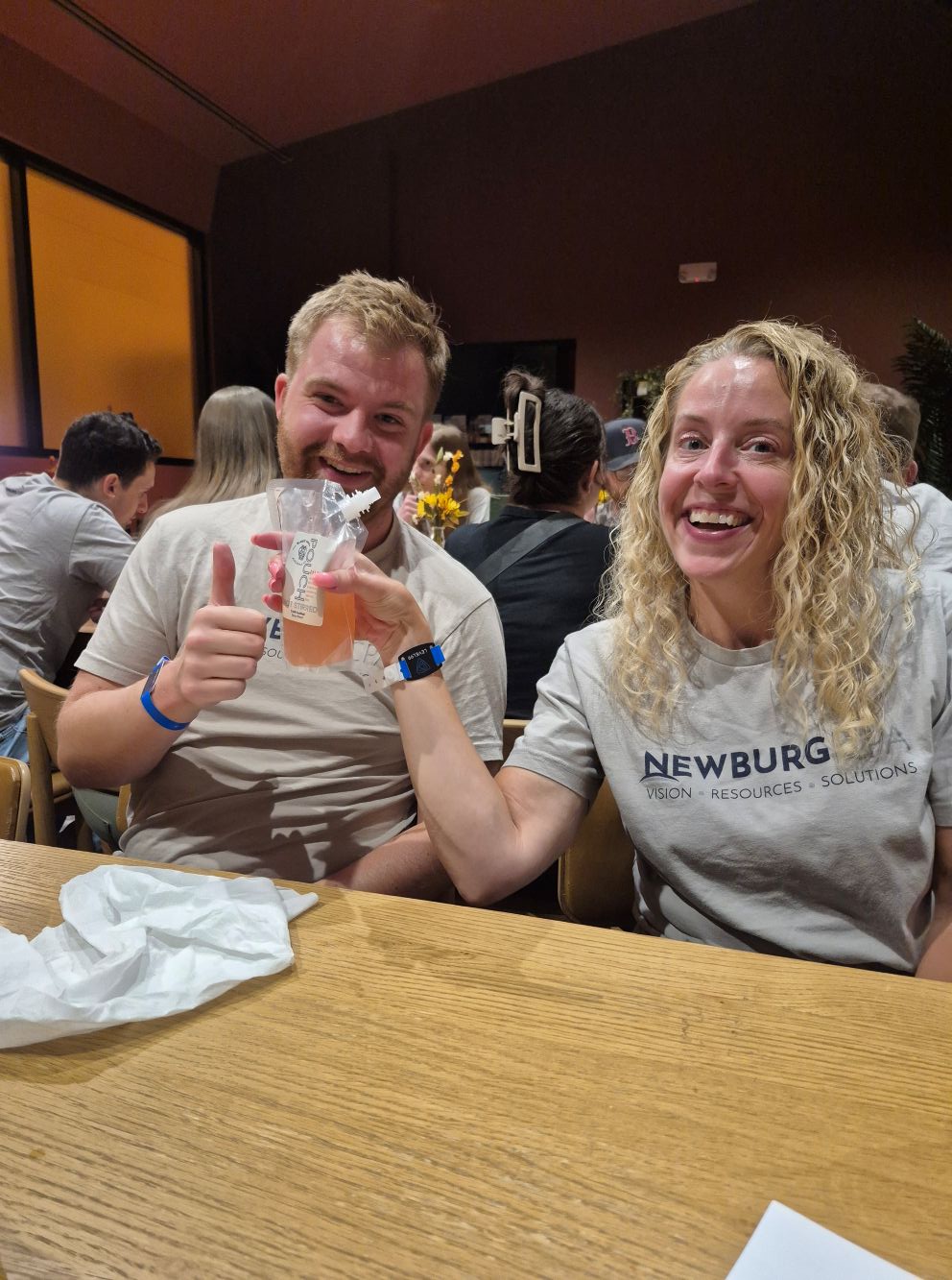 Two friends enjoying juice together