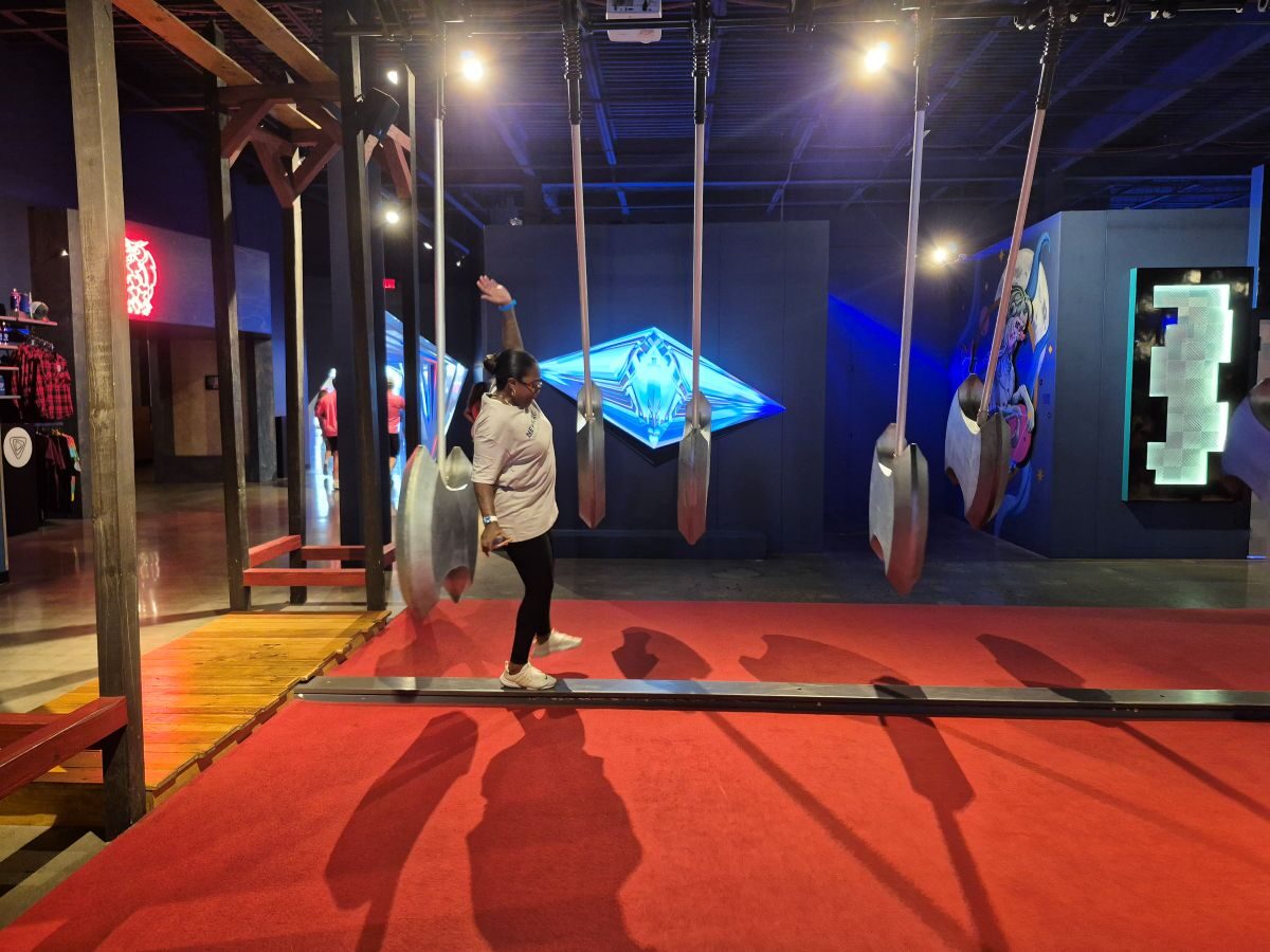 Woman balancing on an obstacle course Woman balancing on an obstacle course